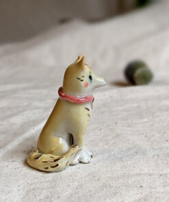 Porcelain dog figurine