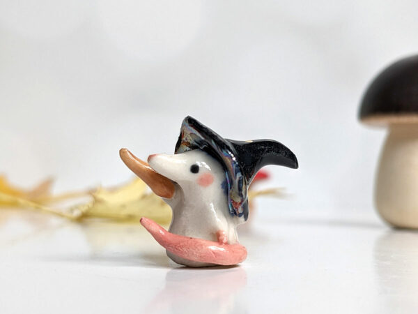 porcelain witch mouse figurine