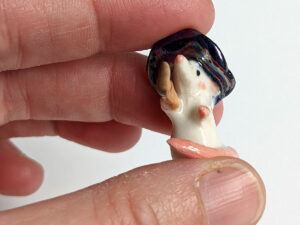 porcelain witch mouse figurine