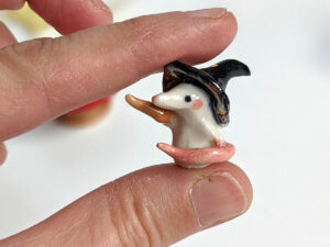 porcelain witch mouse figurine