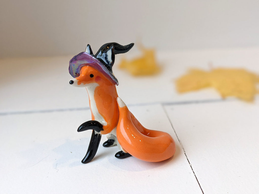 ceramic fox witch figurine