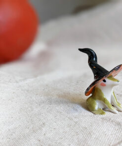 porcelain witch frog figurine