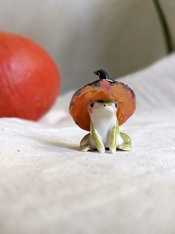 porcelain witch frog figurine