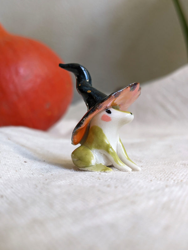 porcelain witch frog figurine