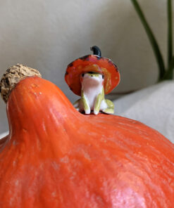 porcelain witch frog figurine