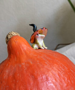 porcelain witch frog figurine