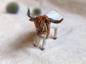 porcelan highland cow figurine