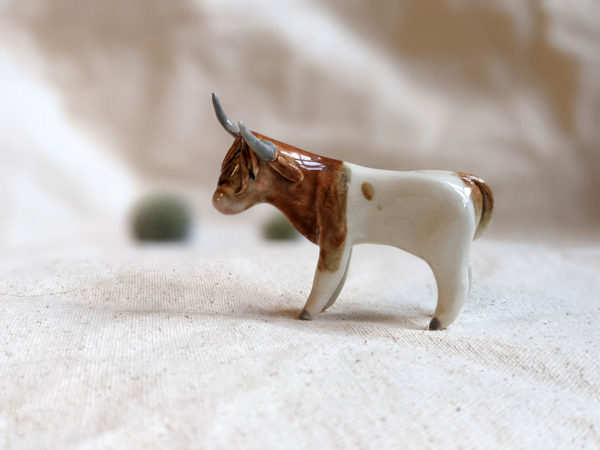 porcelan highland cow figurine
