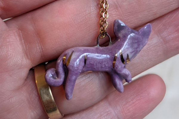 porcelain sphynx cat pendant