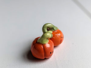 pumpkin couple porcelain figurine