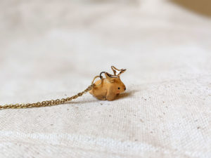 lop bunny pendant with golden antlers