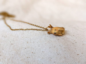 lop bunny pendant with golden antlers