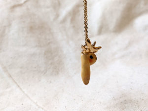 lop bunny pendant with golden antlers