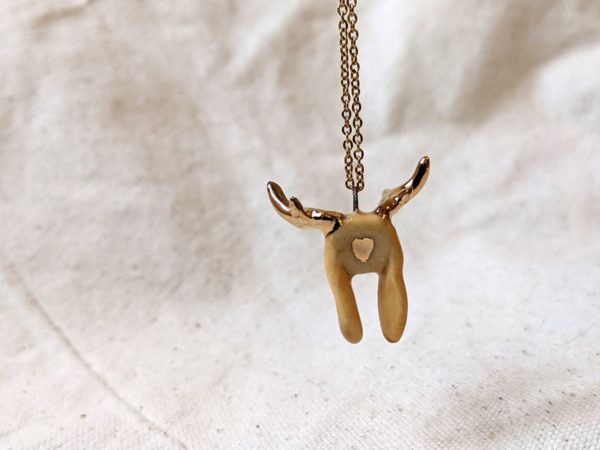 lop bunny pendant with golden antlers