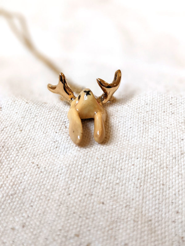 lop bunny pendant with golden antlers