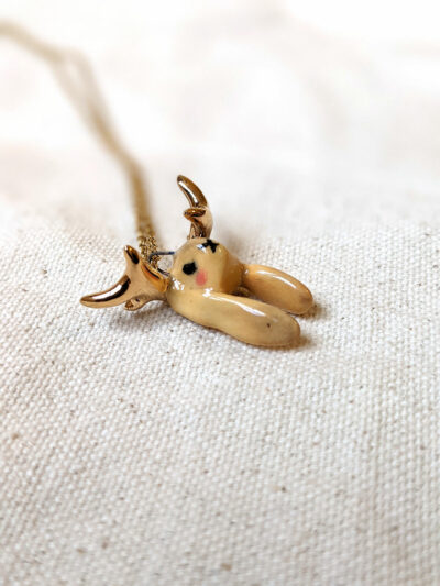 lop bunny pendant with golden antlers