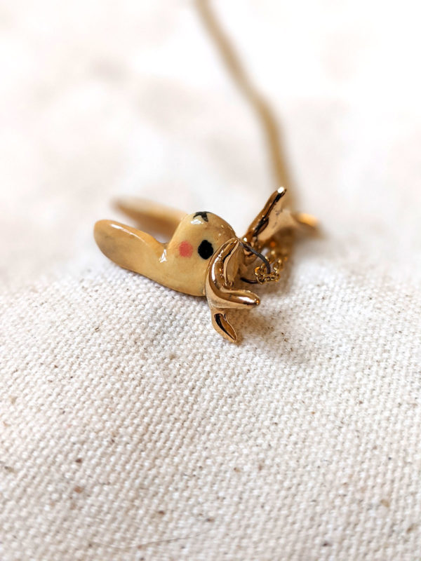 lop bunny pendant with golden antlers