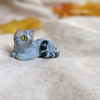 light grey tabby cat figurine porcelain