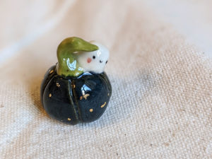 pumpkin porcelain figurine