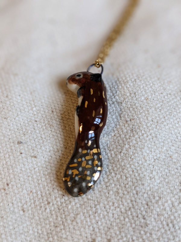 porcelain beaver pendant