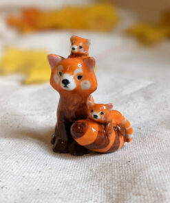 red panda family porcelain figurine