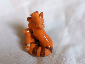 red panda family porcelain figurine