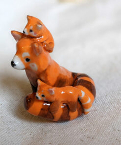 red panda family porcelain figurine