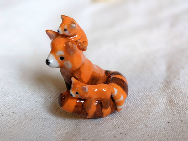 red panda family porcelain figurine