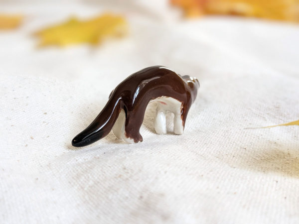 porcelain weasel figurine