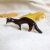 porcelain weasel figurine