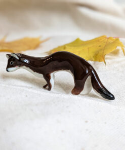porcelain weasel figurine