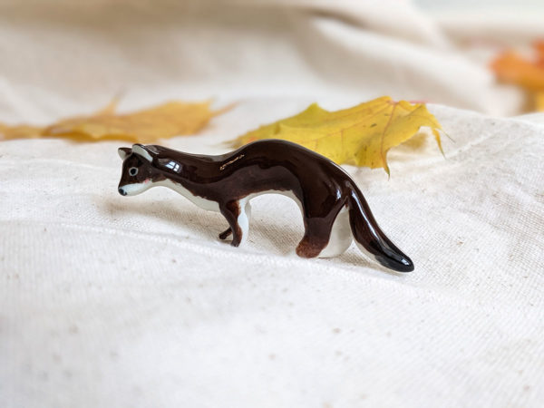 porcelain weasel figurine