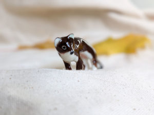 porcelain weasel figurine