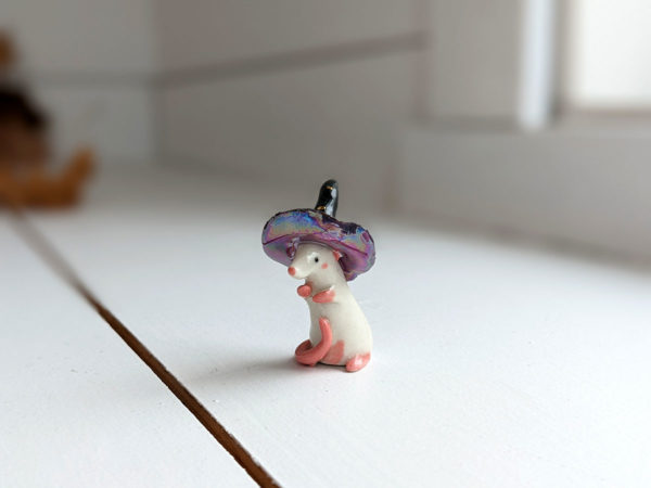 porcelain witch rat figurine