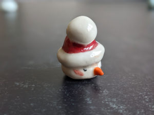 snow ball hat figurine porcelain