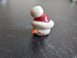 snow ball hat figurine porcelain