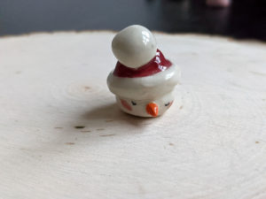 snow ball hat figurine porcelain