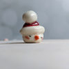 snow ball hat figurine porcelain