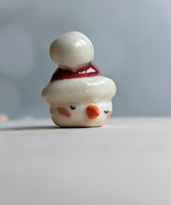 snow ball hat figurine porcelain