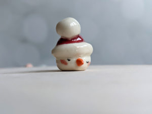 snow ball hat figurine porcelain