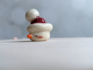 snow ball hat figurine porcelain