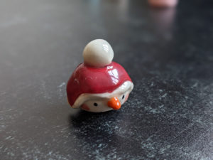 snow ball hat figurine porcelain