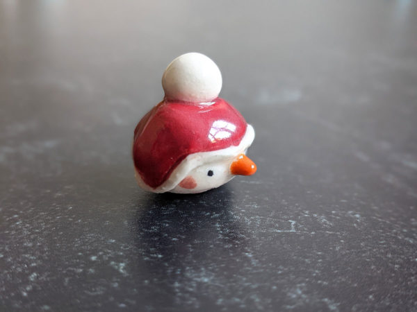 snow ball hat figurine porcelain