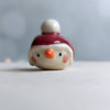 snow ball hat figurine porcelain