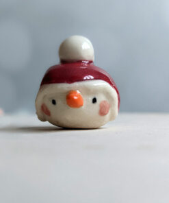 snow ball hat figurine porcelain