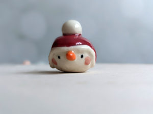 snow ball hat figurine porcelain