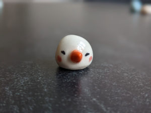 snow ball hat figurine porcelain