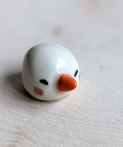 snow ball hat figurine porcelain