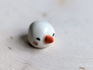 snow ball hat figurine porcelain