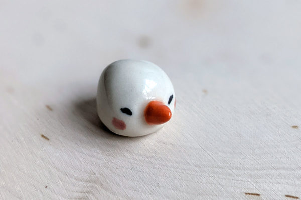 snow ball hat figurine porcelain